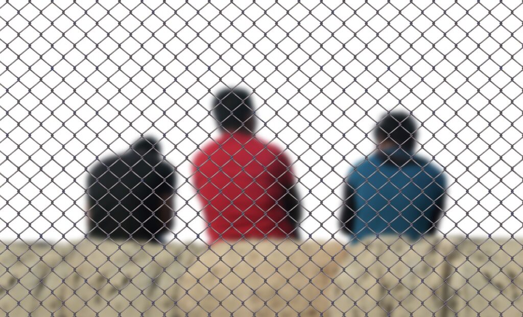 fence, men, refugee-3585348.jpg