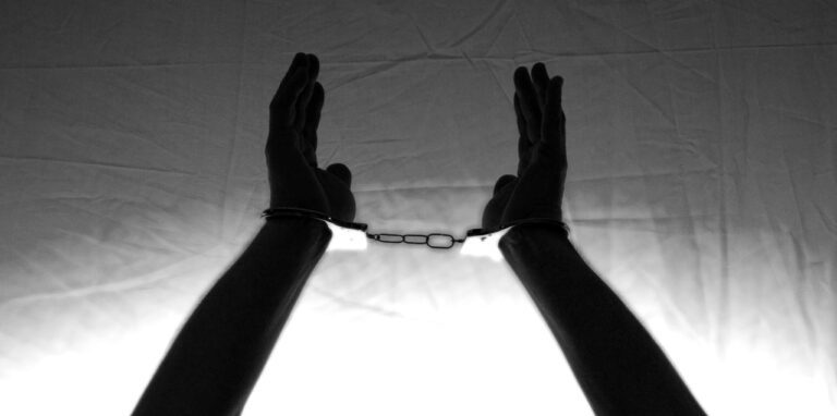 hands, handcuffs, tied up-1655520.jpg
